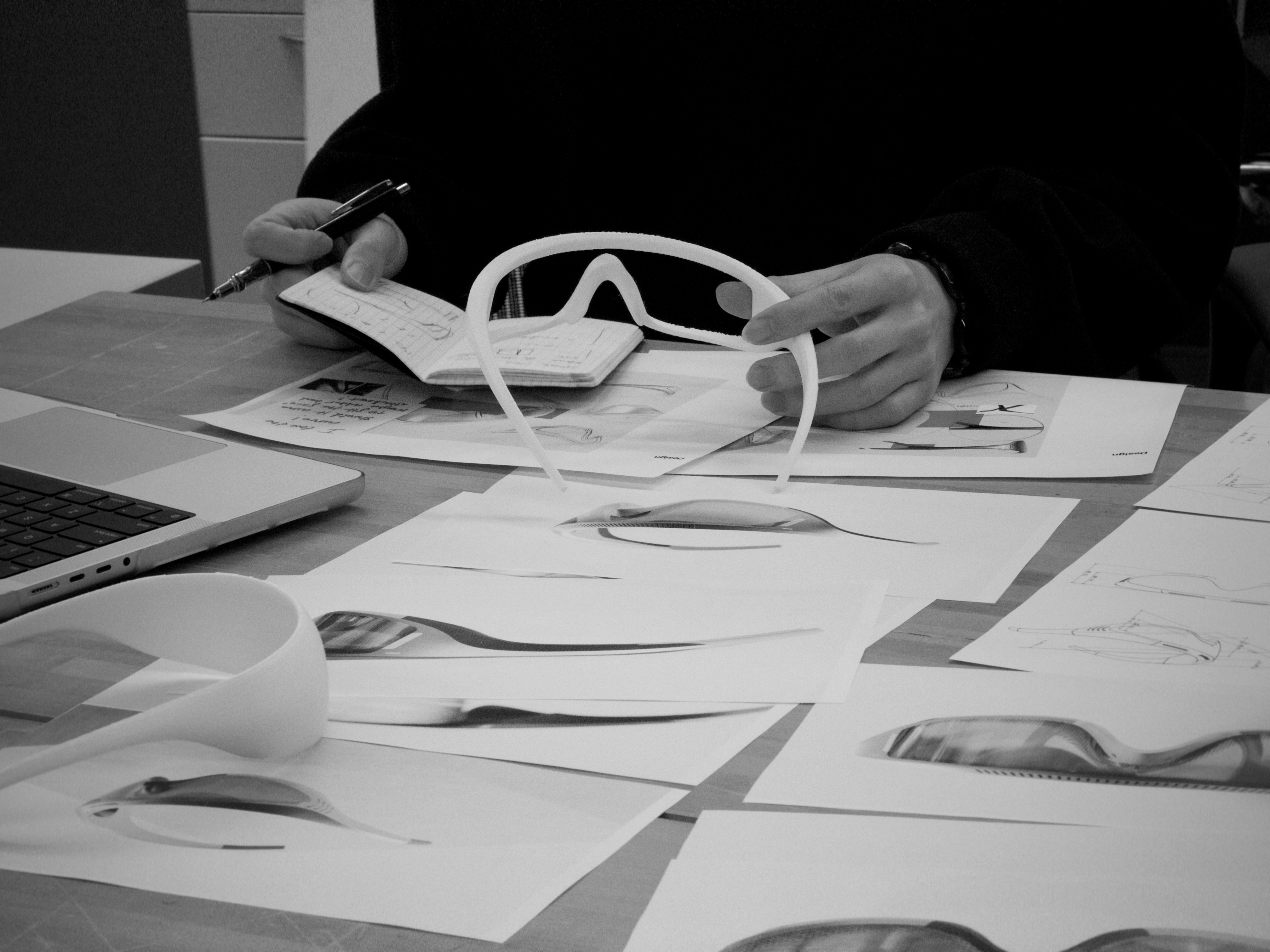 PRISM design work on a studio desk